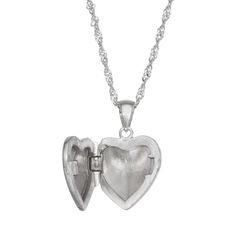 Featuring a gorgeous cubic zirconia stone, this beautiful sterling silver heart locket necklace is the perfect way to show your little one how much you love them. Featuring a gorgeous cubic zirconia stone, this beautiful sterling silver heart locket necklace is the perfect way to show your little one how much you love them. Pendant size: 14 mm x 11 mm Chain length: 15 in. Chain type: link Clasp: spring-ring Metal: sterling silver Plating: rhodium Finish: polished Packaging: boxedSTONE DETAILS St Antique Locket Necklace, White Gold Heart Pendant Locket Necklace For Gift, Silver Hypoallergenic Jewelry For Keepsake, Hypoallergenic Silver Jewelry For Keepsake, Silver Charm Necklace For Valentine's Day Keepsake, White Gold Heart Pendant Locket Necklace With Heart Charm, Silver Dainty Locket Necklace With Round Pendant, White Gold Heart Locket Necklace With Heart Charm, Heart Pendant Locket Jewelry As Gift For Mom