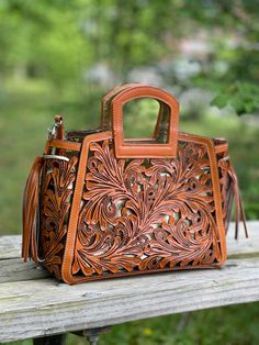 Fine Genuine Hand-tooled Leather Tote Bags & Purses, Best, Online, Buy – ALLE Handbags Black Hand Tooled Bags For Everyday Use, Western Hand Tooled Bags For Daily Use, Hand Tooled Western Bags, Artisan Hand Tooled Black Bag, Black Hand Tooled Tote Shoulder Bag, Brown Hand Tooled Tote Bag, Most Expensive Bag, Western Style Hand-tooled Bag For Daily Use, Vintage Hand Tooled Tote Satchel