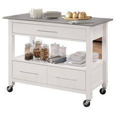 a kitchen island cart with food and drinks on it