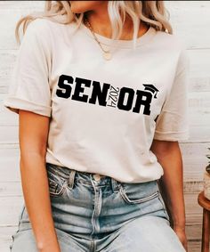 a woman wearing a t - shirt that says senior