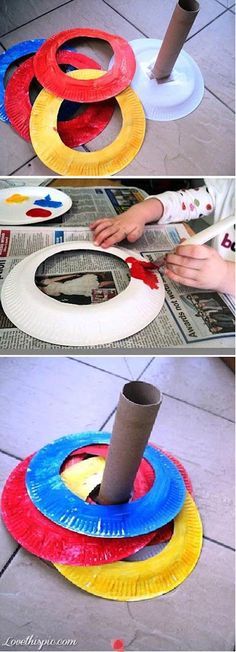 some paper plates are stacked on top of each other to make a toilet paper roll art project