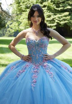 Whimsical quinceanera ball gown features delicate three-dimensional floral embroidery lining the sweetheart neckline and detachable pouf sleeves and highlighting the basque waist. Sparkling jewel beading pops on the corset bodice with a voluminous sparkle tulle skirt and oversized detachable back bow. Matching stole included. Dream Daughter, Quinceañera Dresses, Pageant Interview, Allure Couture, Basque Waist, Disney Wedding Dresses, Pretty Quinceanera Dresses, Gorgeous Prom Dresses, Quince Ideas