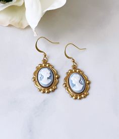 Classic resin cameos in an ornate oval brass setting with brass French ear wires. Designed and hand assembled by Robyn Joy. Cameo Drop Earrings Jewelry Gift, Cameo Drop Earrings As Gift, Gift Cameo Drop Earrings Jewelry, Gold Cameo Oval Earrings, Gold Oval Cameo Earrings, Victorian Vintage Charm Drop Earrings, Cutesy Jewelry, Romantic Academia, Slide Bracelet