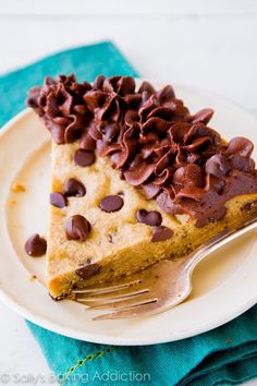 a piece of chocolate chip pie on a plate with a fork