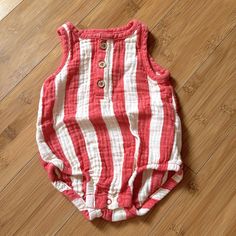 Red And Ivory Striped Romper Onesie. New Without Tags. Never Worn. Red Bubble Romper For Summer Playwear, Summer Red Bubble Romper For Playwear, Red Bubble Romper For Summer Beach, Red Cotton Bubble Romper For Spring, Casual Red Bubble Romper For Playwear, Cute Red Bubble Romper For Playtime, Playful Red Sleeveless Bubble Romper, Playful Red Cotton Bubble Romper, Cute Red Cotton Bubble Romper