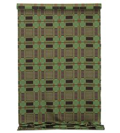 a green and brown checkered roman blind