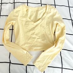 Nwot Pale Pastel Yellow Long Sleeve V-Neck Size Xs Nwot No Flaws Never Worn Cropped Fit Trendy Solid Color V-neck Crop Top, Trendy V-neck Solid Color Crop Top, Stretch V-neck Crop Top In Solid Color, Stretch V-neck Crop Top Solid Color, Stretch V-neck Solid Color Crop Top, Yellow Stretch V-neck Top, Yellow Solid Color V-neck Top, Yellow Stretch Solid Color Top, Casual Yellow V-neck Top