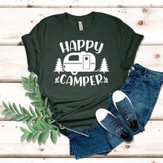 Happy Camper T-shirt, Happy camper, RV Travel Shirt, Camping Gift, Travel Shirt, Vacation Shirt, Camper T-shirt for Men ----- How To Order ----- 1. Select the shirt size & color. 2. Choose your text color. 3. Add your text/personalization request 4. Select the quantity. 5. Click to Add to Cart. 6. Start to wait for your doorbell to ring! ----- Unisex Shirts ----- * Unisex t shirt fits like a well-loved favorite, featuring a crew neck, short sleeves and designed with superior airlume combed and r Camper Design, Girls Weekend Gifts, Camping Hair, Travel Shirt, Adventure Shirt, Hiking Shirts, Graphic Tee Shirt, Rv Travel, Camping Gifts