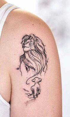 a woman's arm with a tattoo on it that has an image of a mermaid and a dog