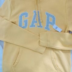 Gap Men’s Size M Heritage Logo Hoodie Pullover Yellow Long Sleeve Shirt Color: French Almond Yellow Size: M (Men's, Can Also Be Women's M-L) Gap Patch Logo On Front. Super Soft! New With Tag. Never Worn. Gap Cotton Crew Neck Hoodie, Gap Long Sleeve Tops With Drawstring Hood, Winter Sweatshirt By Gap, Gap Long Sleeve Fleece Sweatshirt, Gap Fleece Hoodie, French Almond, Yellow Long Sleeve Shirt, Heritage Logo, Gap Hoodie