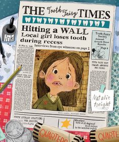 a newspaper with a drawing of a girl on the front page and other items surrounding it