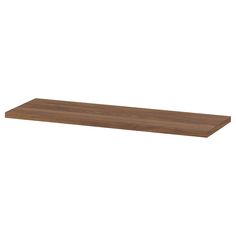 a wooden shelf that is on the wall