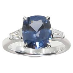 Please check out the HD video! Here is a super rare natural Cobalt Spinel and diamond ring. The certified cobalt Spinel is 2.23Cts. The ring is set in 18k white gold and diamonds. Two tapered Baguettes totaling 0.29Cts on each side of the Spinel. The rare Cobalt Spinel is very clean and It is full of life. The blue color is unforgettable. It is certified with no heat treatment or any enhancements. It is a great piece for investors and connoisseurs looking to add to their collection. It is a well Spinel Jewelry, Diamond Cocktail Ring, Diamond Cocktail Rings, No Heat, Cocktail Ring, Cocktail Rings, Cobalt, The Collector, Diamond Ring