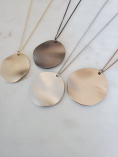 "Simple Geometric Wave Circle Plate Pendant Long Necklace Chain Length: 24″ + 2\" Adjustable Extension. Total 26\" Clasp: Yes Type of Clasp: Lobster Claw Pendant Length: 1 1/4\" Pendant Width: 1 1/4\" Weight: 9g Metal: Rhodium or gold plated chain, brush metal pendant, tarnish resistant Options: Silver Gold  Gunmetal Champagne" Geometric Wave, Woman Necklace, Necklace For Her, Necklace Chain Lengths, Brushed Metal, Keep Jewelry, Metal Pendant, Gold Plated Chains, Necklace Chain