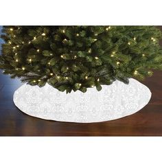 a christmas tree skirt with lights on it