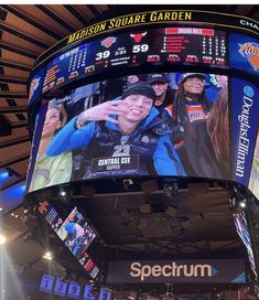 the scoreboard at madison square garden in new york city is lit up with bright lights