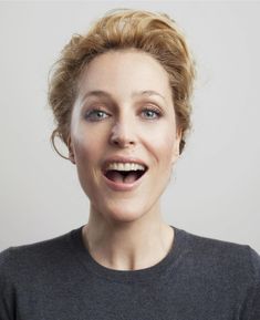 a woman making a funny face with her mouth open