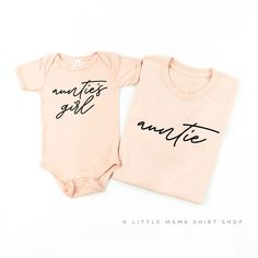 two pink onesuits with black writing on them that say, another girl and another little mama shirt shop