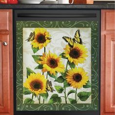 sunflowers and butterflies are painted on the backsplash of this kitchen cabinet