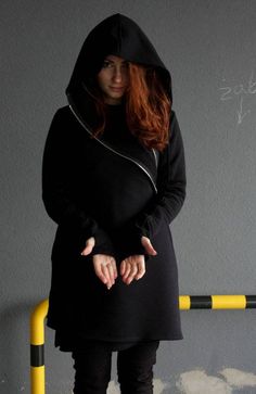 "Express Shipping to the USA, UPS Courier for free Delivery 3-5 Business Days  Thanks for your love for the Hoodie/Coat. Our Hoodie is made from good grade cotton from Poland, black color. You will find this material as a very soft to the touch. On the front you can find original asymmetrical short zip closure and two side/front pockets. This Hoodie has the special hood and extra long sleeves with thumb holes. It is suitable for all seasons.  Hoodie vest is made of: 90% cotton 10% polyester You Goth Coat, Elven Clothing, Pixie Outfit, Asymmetrical Coat, Book Pictures, Style Steampunk, Buy Hoodies, Women's Hoodie, Hoodie Women