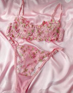 This vintage-inspired bralette set is a beautiful blend of romance and nostalgia, crafted from soft pink sheer tulle and adorned with delicate rose motifs. Its design exudes a charming, feminine appeal, perfect for those who appreciate a touch of vintage elegance with a modern twist. The sheer fabric adds a subtle allure, making this bralette set not only visually stunning but also incredibly comfortable. Here are some key features of this bralette set: Fabric: Made from soft pink sheer tulle, t Flower Lingerie, Affordable Lingerie, Body Lingerie, Floral Lingerie, Cute Lingerie, Pink Lingerie, Perfect Bra, Lingerie Outfits, Pretty Lingerie