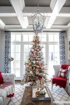 a decorated christmas tree in a living room