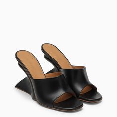 Sabot by Off-White in black leather featuring a wedge heel, a band upper, an open toe and a leather sole.Heel 9 cm100% Leather / Leather sole Winter Sale, Wedge Heels, Fashion Designer, Gender Female, Open Toe, White And Black, Black Leather, Wedges, Off White