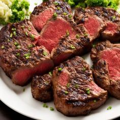 steak, broccoli and cauliflower on a plate