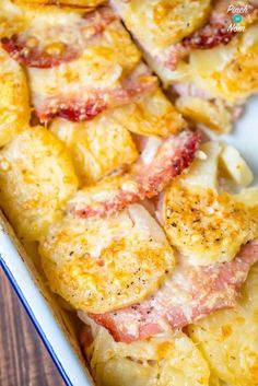 a casserole dish with ham and cheese on top, ready to be eaten