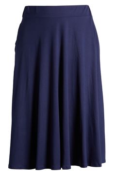 A flowy silhouette and an ultrasoft jersey fabrication create a comfy fit in this midi-length skirt that sways with every step you take. 30" length Elastic waist Unlined 92% polyester, 8% spandex Machine wash, tumble dry Imported 4-way Stretch Flared Lined Skirt, Flared Lined Skirt With 4-way Stretch, Flowy Midi Skirt In Elastane, Knee-length Flowy Elastane Skirt, Flowy Knee-length Elastane Skirt, Solid Flowy Elastane Maxi Skirt, Flowy Solid Color Midi Skirt, Blue Casual Skirt With 4-way Stretch, Casual Blue Skirt With 4-way Stretch