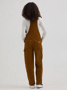 When cool weather comes, it’s corduroy or nothing. Fortunately, our Women’s Straight Leg Corduroy Bib Overall has everything you could need and want in the seasons to come. Crafted from cotton, this workwear-inspired staple features a regular fit through the seat and a straight leg that looks good with everything. These updated overalls also come with adjustable straps, a classic bib front, the signature “W” embroidery, a hammer loop, and plenty of pocket space. Women’s Overalls, Women In Suspenders, Overall Outfits, Bib Overalls, The Seasons, Suspenders, Work Wear, Adjustable Straps, Overalls