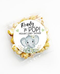 a bag of baby shower popcorn with an elephant on it