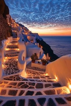 an alley leading to the ocean at night