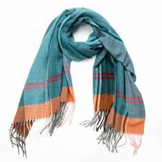 The Amila Scarf is the perfect scarf to complete any outfit. Great colors and fringe make it versatile and easy to wear. Adds a pop of color to your favorite coat or jean jacket. Add our gloves and hats for extra warmth. Details & Care One Size 100% Polyester 69"L x 26.625W, 3.2" Fringe Machine wash cold. Hang dry. Imported Hanging Dryer, Resort Wear, Jean Jacket, Color Pop, Gloves, Weaving, Hats, How To Wear, Blue