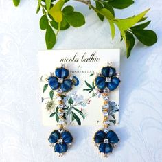 Antonio Melani X Nicola Bathie Statement Earrings New With Tags Excellent Condition Georgous Royal Blue Carved Shell Flower Stoned Earrings Accented With Gold And Cubic Zirconias Linear Silhouette Approx 2" Drop Gold Screw Back Posts And Backing For Secure Fitting And Also Has Comfortable Rubber Stoppers For Double Enforcement Would Be Beautiful To Wear For A Wedding (Something New Something Blue), Engagement Party, Holidays Or A Special Occasion. Any Girl Would Be Excited To Own These To Add Pi Elegant Blue Flower Earrings For Anniversary, Blue Elegant Earrings With 3d Flowers, Blue Engagement Party, Statement Earrings Bride, Blue Flower-shaped Formal Earrings, Adjustable Nickel-free Blue Flower Earrings, Nicola Bathie, Blue Statement Earrings, Luxury Blue Flower-shaped Earrings