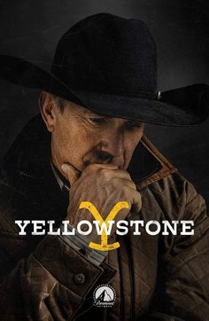 a man wearing a cowboy hat and holding his hand to his face with the words yellowstone on it