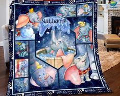 an elephant blanket with pictures of elephants and other animals on it in front of a fireplace