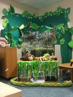 an office decorated for st patrick's day with stuffed animals and green streamers