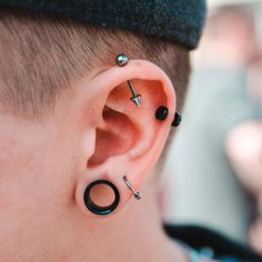 a man with ear piercings on his ears