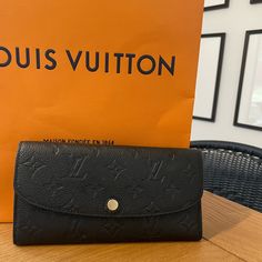 Selling My Authentic Louis Vuitton Emilie Wallet Purchased In 2018 From The Downtown Portland, Oregon Store. I Haven’t Used It In Years So Time To Sell Since It Doesn’t Fit In Some Of My Smaller Bags. Excellent Condition, Only Slight Sign Of Wear Is Around The Button (Up Close Photo Is Included). Black Monogram Empreinte Leather With Beige Interior. Great Classic Style! Downtown Portland Oregon, Louis Vuitton Emilie Wallet, Emilie Wallet, Downtown Portland, Beige Interior, Portland Oregon, Small Bag, Authentic Louis Vuitton, Portland