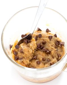 chocolate chip cookie in a glass bowl with a spoon