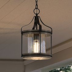 A unique UHP1420 Farmhouse Outdoor Pendant 15''H x 10''W, Midnight Black Finish, Gilbert Collection lamp hanging over a porch, made by Urban Ambiance. Lantern Style Chandelier, Candle Box Design, Clean Metal, Luxury Exterior, Urban Interiors, Farmhouse Outdoor, Vintage Aesthetics, Outdoor Pendant Lighting, Remodel Kitchen