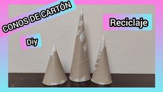 three paper cones sitting on top of a table with the words congros decoration diy