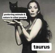 a woman holding a black cat with caption that reads, performing animals & nature to other people taurus