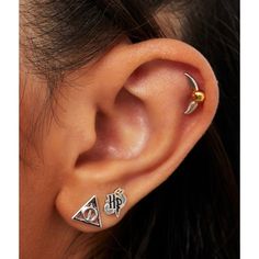 Step into the enchanting world of Hogwarts with this officially licensed Harry Potter stud earrings set. Each piece is meticulously crafted to bring a touch of magic and elegance to your style.

- Material: Gold and silver-plated
- Set includes: 3 pairs of earrings – Golden Snitch two-tone studs, HP logo two-tone studs, and Deathly Hallows studs
- Color: Gold and silver
- Gender: Female
- Age Group: Adult

These earrings feature iconic symbols from the beloved series, with detailed designs that Harry Potter Rings, Harry Potter Gift Box, Harry Potter Ring, Hp Logo, Harry Potter Logo, Harry Potter Jewelry, Fan Jewelry, Earrings Sets, Golden Snitch