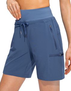 PRICES MAY VARY. 2.7'' Knitted Waistband: 2.7" Soft knitted high waistband with elastic and drawstring reduces friction on the torso, improving the wearing experience. They lay very smoothly and don't create lumps and bumps. Ligtweight & Quick Drying Fabric: The women's hiking shorts features lightweight, quick dry and breathable fabric to keep you cool and fresh all day in hot summer days. 4 Zipper Pockets: Two side and two thigh zipper pockets are deep enough to store your phones, keys, cards Long Shorts For Women, Jogger Outfit, Joggers Outfit, Hiking Shorts, Casual Joggers, Shorts Cargo, Shorts For Women, Hiking Women, Long Shorts