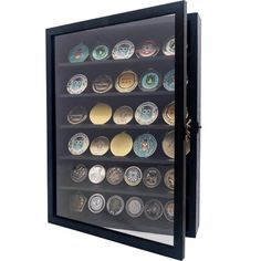 a display case filled with lots of different types of buttons