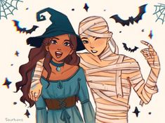 two people dressed up as witches and bats