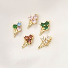 14K Gold Plated CZ Ice Cream Charm Pendant, Dessert Bracelet, Food Necklace, Sweet Earring, Popsicle Jewelry, Ice Cream Cone Charm {Material}: copper, brass, zircon {Size}: 7*13mm ♥ Custom instructions: * If you have specific requests for this item, such as adding a logo, altering the size and color, please be aware that custom orders typically have a minimum quantity requirement and have a lead time of 2 weeks. If you're able to meet these requirements, please let us know and we'll provide you with further details. We have more unique and amazing jewelry accessories, please click the link below: charms https://www.etsy.com/shop/MlssSupplies?section_id=33859044 beads https://www.etsy.com/shop/MlssSupplies?section_id=33859050 chains https://www.etsy.com/shop/MlssSupplies?section_id=33859054 Sweet Gold Dangle Jewelry, Popsicle Jewelry, Charms For Necklaces, Food Necklace, Sweet Earrings, Ice Cream Cone, Summer Colors, Pendant Set, Lead Time