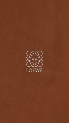 a brown leather book with the word loewe on it